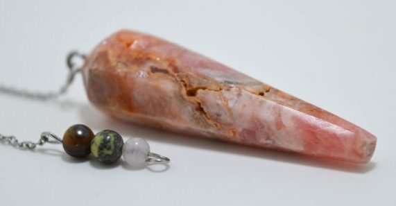 Péndulo de Rodocrosita con bolitas de piedra narutal