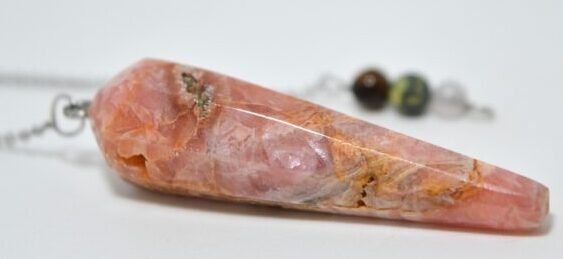 Péndulo de Rodocrosita con bolitas de piedra narutal