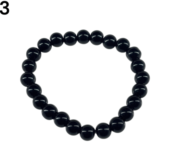 Pulsera de Ónix negro pulido con bolitas elástizada