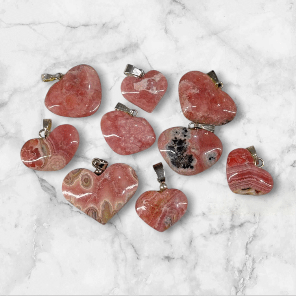 Dijes de Rodocrosita corazón con acero.