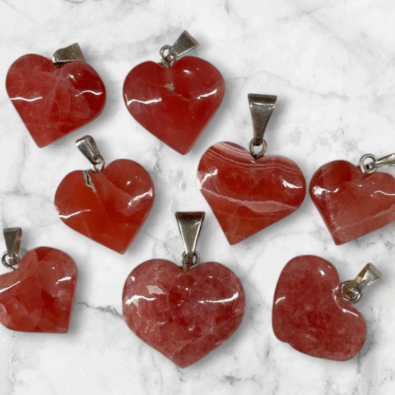 Dije de Rodocrosita corazón calidad ortiz con plata