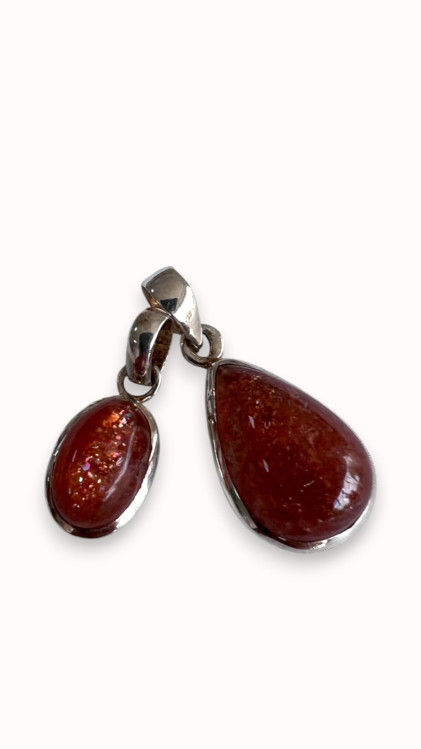 Dije piedra del sol engazado en plata
